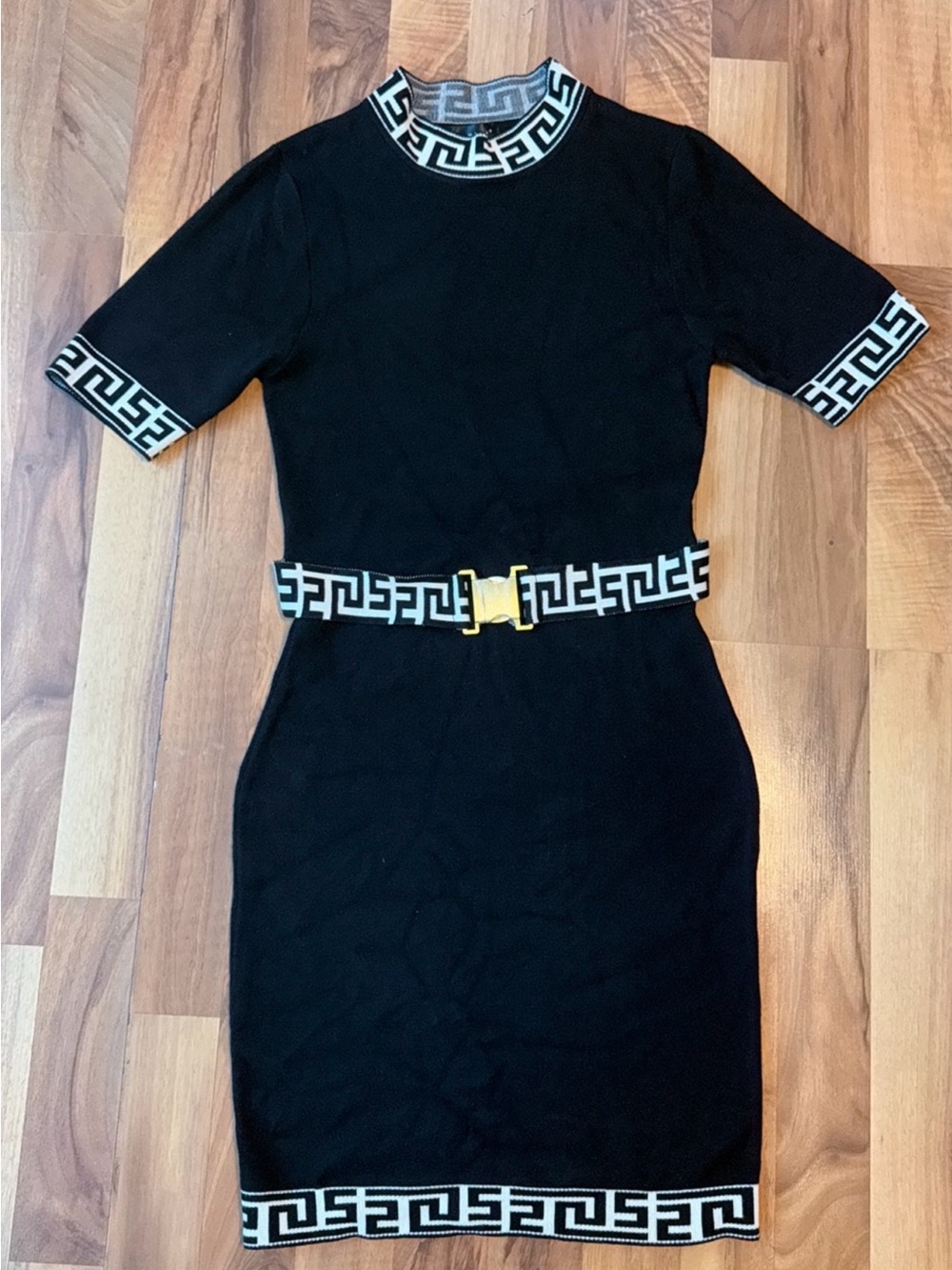 Say What? Black Midi Dress with White Geometric Trim and Gold Buckle